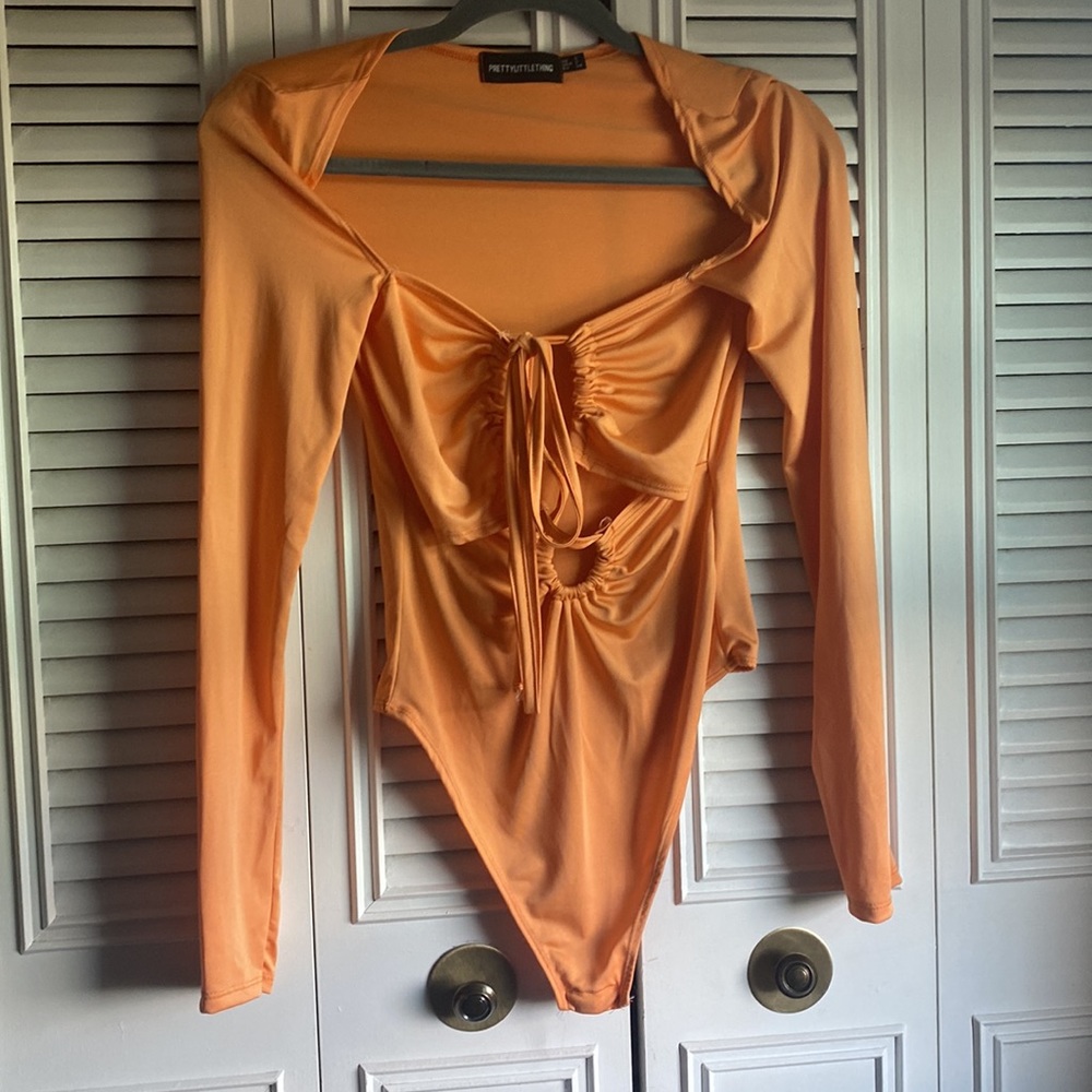 PLT orange cut out bodysuit